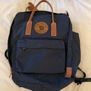 Fjallraven navy and brown kanken backpack